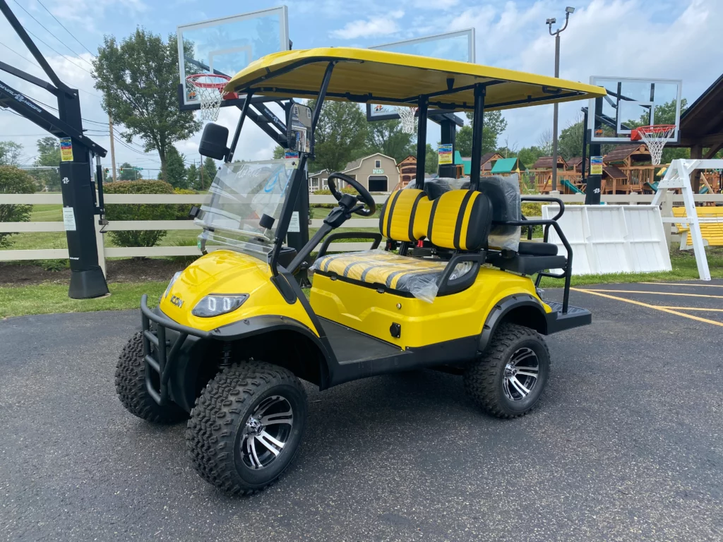 black and yellow golf cart