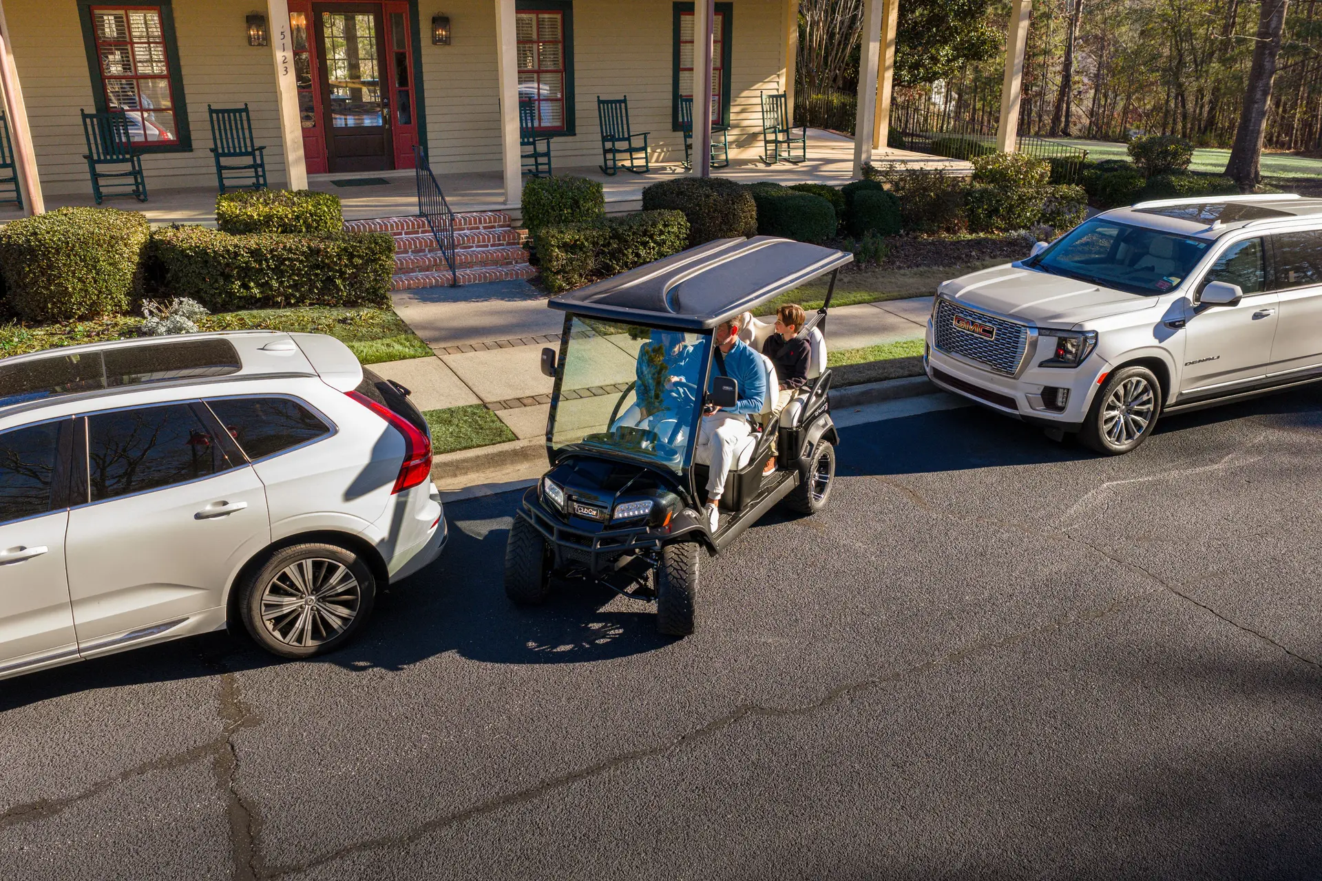 Club Car Onward street legal golf cart in a neighborhood