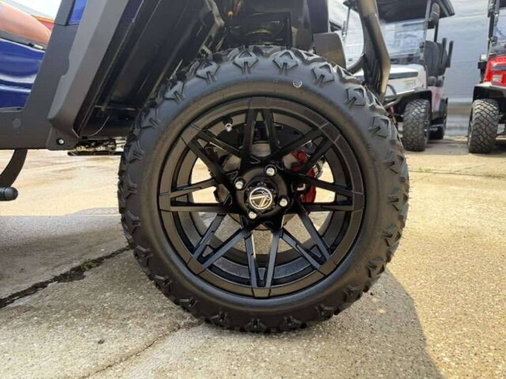 vcart lifted cruiser 4 black alloy wheels and all terrain tires