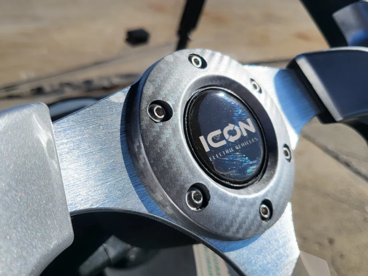 icon golf cart stirring wheel