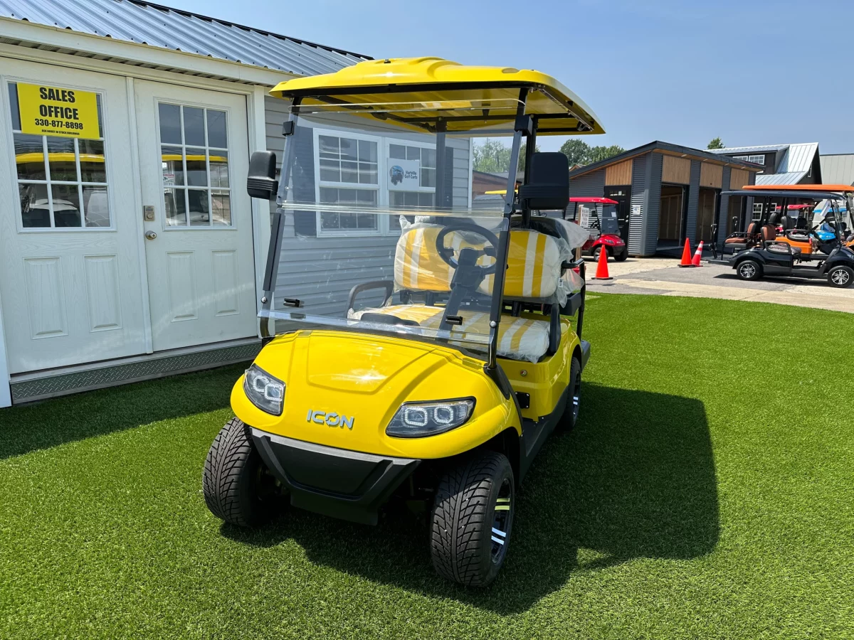 yellow and white golf cart